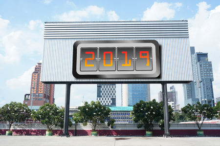 Digit Year clock on advertising board background.の写真素材