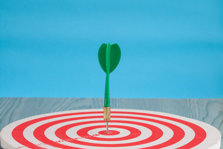 Dart arrow on target dartboard ,Business success concept.