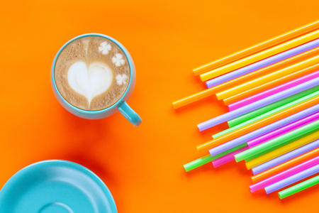 Hot Coffee Latte Art Heart on colour background.の写真素材