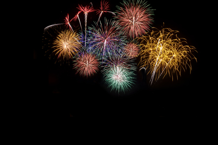 Colorful of fireworks in holiday new year festival on black sky.の写真素材