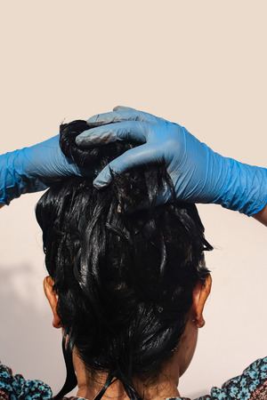 Home made hair Treatment with mud to resolve with gray hair.の写真素材