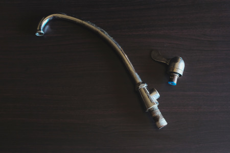 Faucet repair or broken on black background.の写真素材