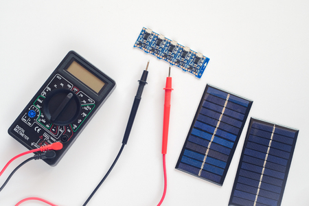 Mini solar panel and tool on background .の写真素材