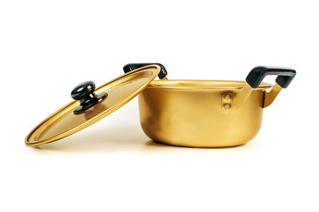 Gold metallic pot kitchenware on white background.の写真素材