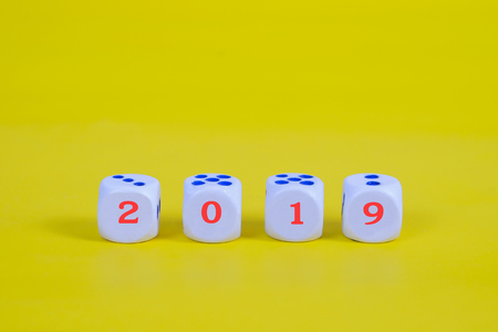 2019 word on white dice on color background,new year concept.の写真素材