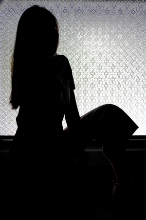 silhouette of body shape with soft light .の写真素材