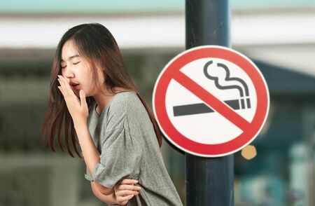 woman suffers from Coughing cold, health concept.の写真素材
