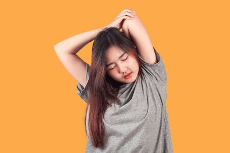 Teen girl exercise for Office Syndrome Prevention.の写真素材