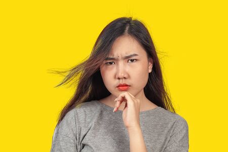 young woman in action thinking or get some idea .の写真素材