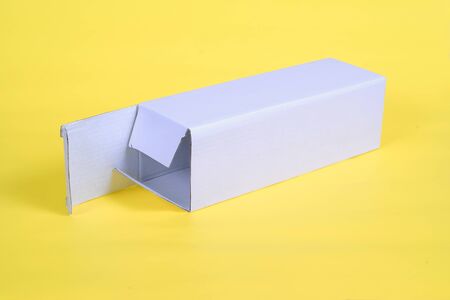 Recycle white cardboard storage box on a color backgroundの写真素材