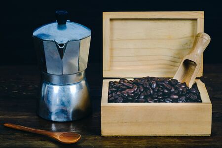 Coffee bean in wood box on old wood background.の写真素材
