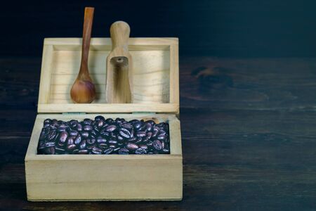 Coffee bean in wood box on old wood background.の写真素材