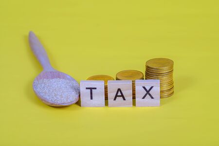 Sugar Tax is a tax or surcharge designed to reduce consumption of drinks with added sugar.の写真素材