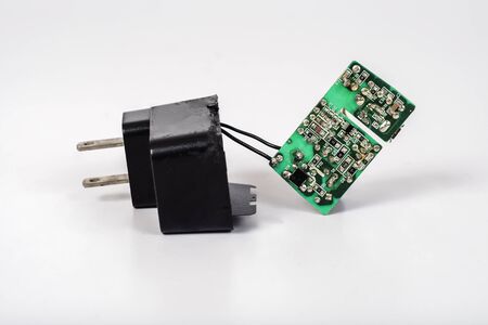 Repair power ac to dc adaptor on background .