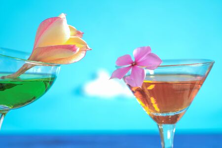 Summer day with cool cocktail on sea beach.の写真素材