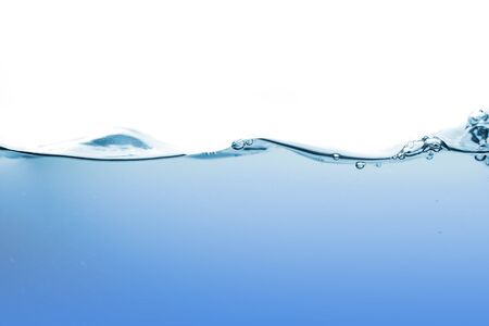 Water splash or water wave with bubbles of air on the background.の写真素材