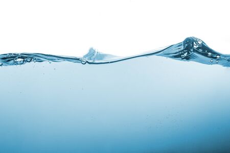 Water splash or water wave with bubbles of air on the background.