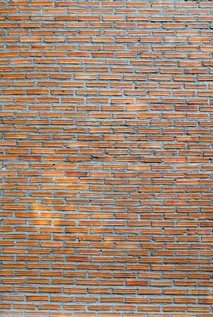 Old and raw brick wall on background or texture.の写真素材