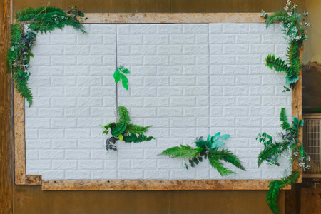 Advertising wood billboard with small plant on copy space.