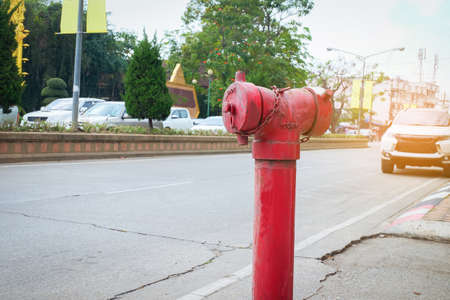 Red Fire Hydrant for fire anticipation on sidewalk.