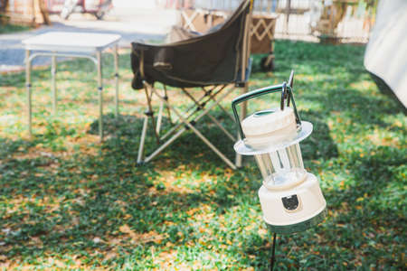 White vintage lantern on camping park .の写真素材