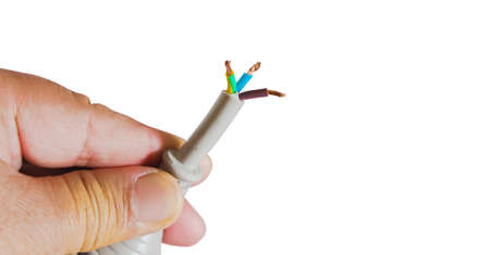 Human hand hold a damage electricity wire on white background.