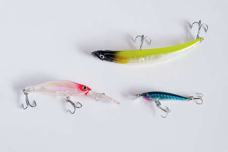 Fishing lures sport equipment on white.の写真素材