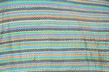 Dirty bag with color texture on background.