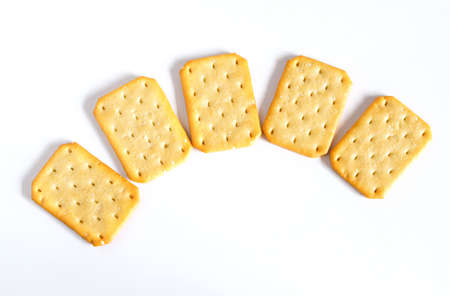 Dry cracker cookies or biscuits on background, concept of food.の写真素材