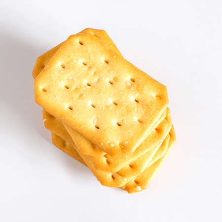 Dry cracker cookies or biscuits on background, concept of food.