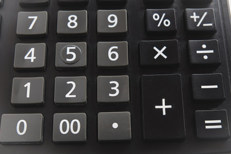 Black Keypad of calculator on white background ,Selective focusの写真素材