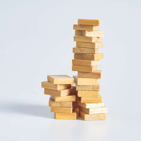 Abstract concept of wooden cubes toy stack to tower.の写真素材