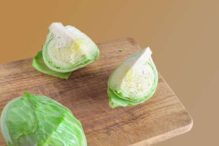 Fresh green cabbage isolated on color background. Organic food.の写真素材