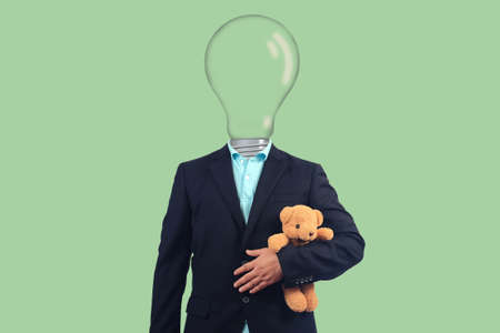 Head blub on Businessmen holding a bear toy on background.
