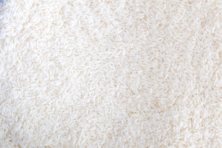 Close up of grains of jasmine rice on background.の写真素材