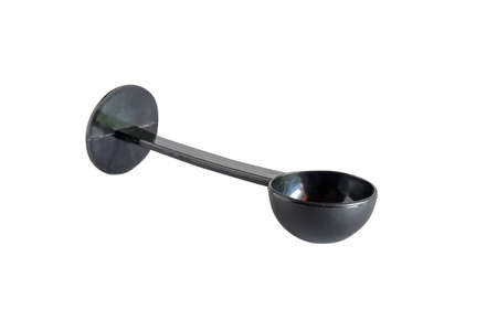 Black spoon plastic coffee or tea isolated on white.の写真素材