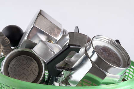 Cleanning moka pot and cup in green basket.の写真素材