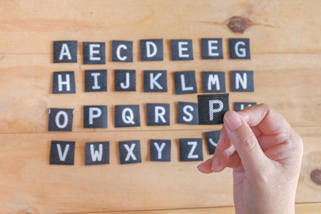 Hand hold a English alphabet letters .の写真素材