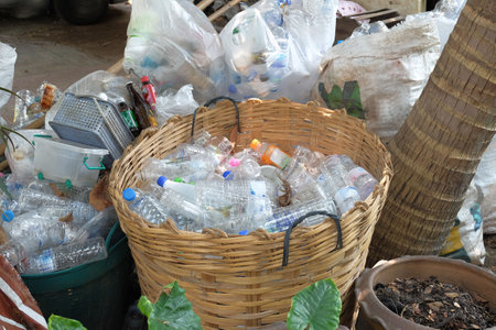 Reuse or recycling bottle in garbage, environment concept.の写真素材