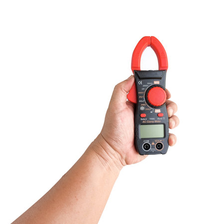 Hand holding clamp multimeter measuring. clipping path.
