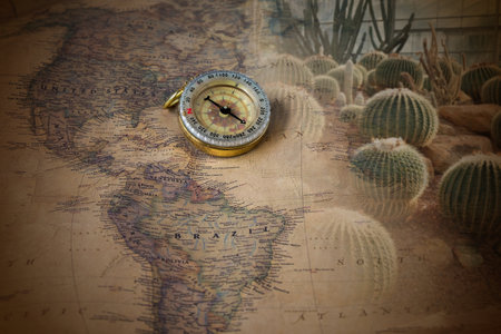 Vintage compass on old world map. Travel, geography, history,の写真素材