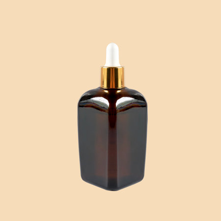 Brown Cosmetic Bottle on a white background.の写真素材