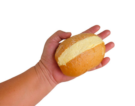 Butter bun in hand on white background.