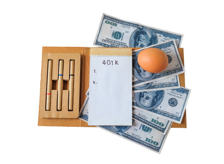 401k  Plan note with egg and Pile of US Money.の写真素材