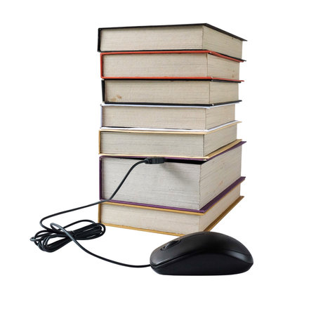 computer mouse connect to stack books.Data concept.の写真素材