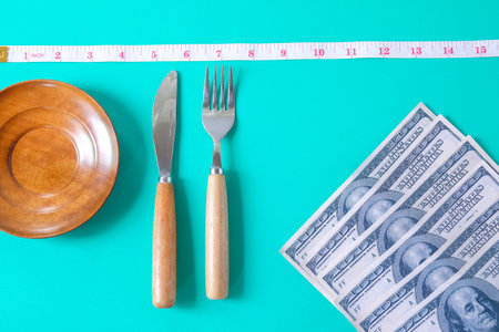 Wood plate with fork and knife with measuring tape,Diet for weight loss concept.