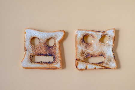 Slices of toasted bread on color background.の写真素材