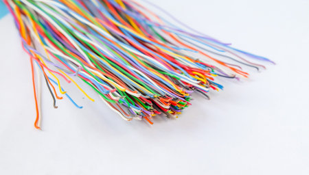 Many colorful electrical wires on background.