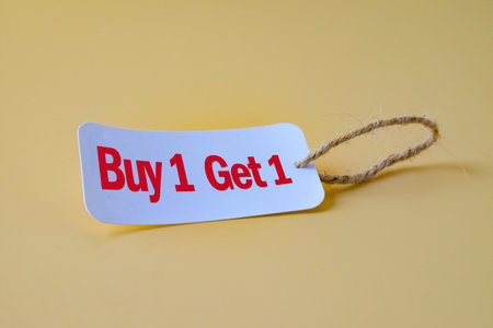 Buy one get one free text, tag sale promotion.の写真素材