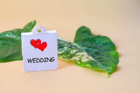White card with Tropical leaves on background.